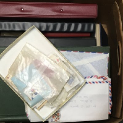 Three boxes containing stamp albums boxes of loose stamps and other associated ephemera.