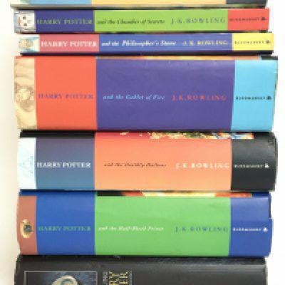 A collection of harry potter books, three being first editions. Postage category C