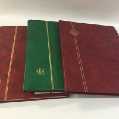 Three stamp albums of George V, Edward VII and more.
