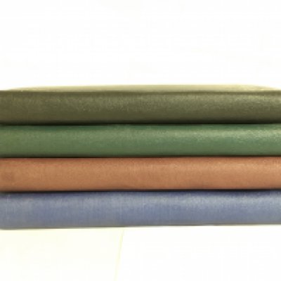 Four George VI & QEII commemorative empire stamp albums. Postage category C