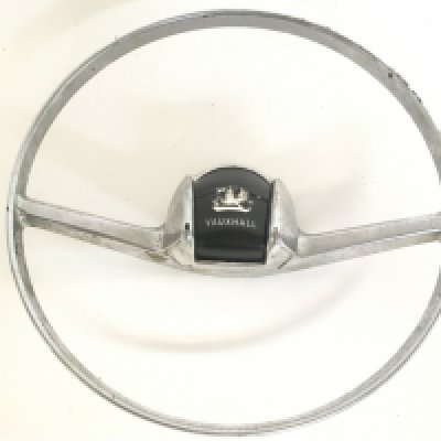 A Vintage Chrome Vauxhall steering wheel, 25.5cm in diameter. postage category C