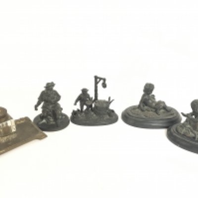 A collection of desk items including late 19th century bronze figures and a brass inkwell. This lot cannot be posted