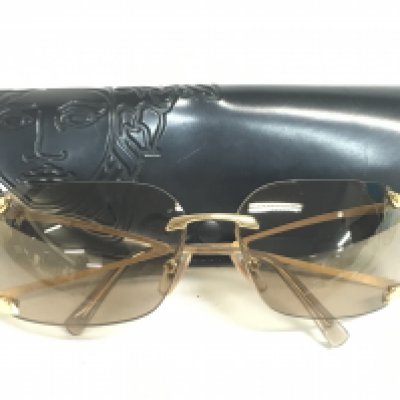 A cased pair of Versace MOD N86 sunglasses
