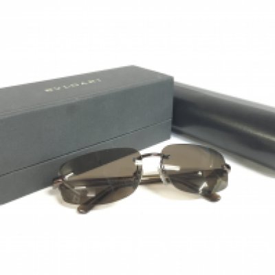 A pair of cased Bulgari sunglasses, postage category A