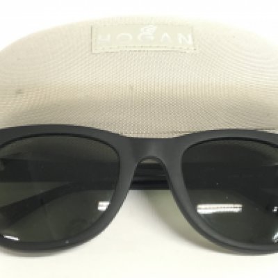 A pair of cased Hogan HO47 col.02N sunglasses. Postage category A