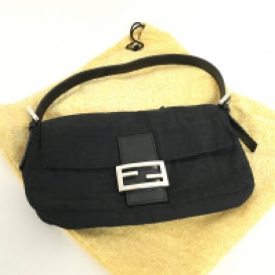 A Fendi Baguette handbag with dust case, postage category C