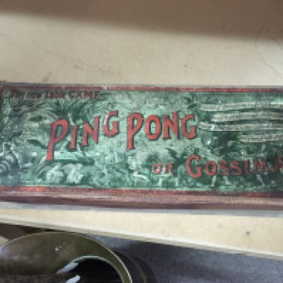 A late Victorian Ping Pong set in original box with fully decorated lid