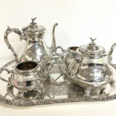 A silver plated Cooper Brothers tea set, coffee pot and tray. Postage category C