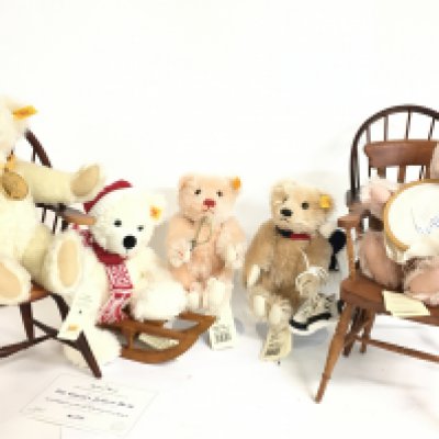 A collection of unboxed Steiff bears with tags including 654558 27 Mother, 654565 23 Boy, 654572 Girl 23, 111488 Welhnachtsteddybar 26 mit Schlitten, 654701 32 Millenium and chairs. Postage category c