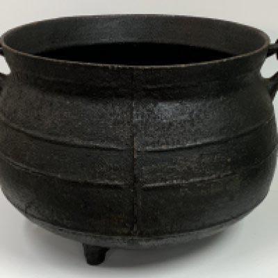 A large 19thC cast iron cauldron, Provenance, believed to have come from the Matcham estate. Diameter 43cm x 30cm.