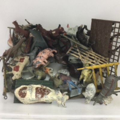 A tub of lead farm animal figures. Shipping category B.