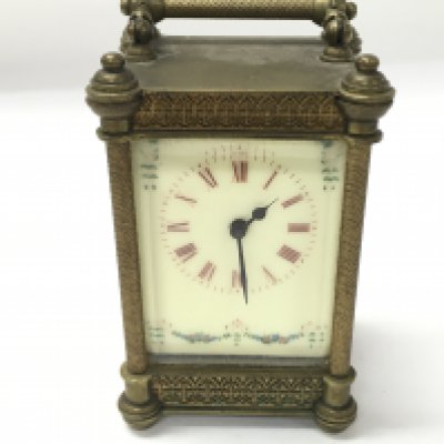 A vintage carriage clock. 11cm by 6cm.