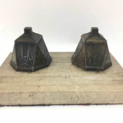 A 19th century desk piece with bronze pyramid shaped inkwells on a marble base