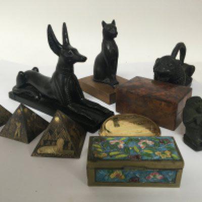 A Chinese enamel Box a collection of Egyptian inspired ornaments.