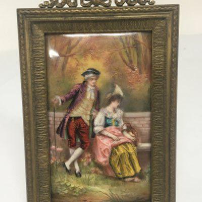 A Quality Limoges enamel framed plaque circa 1890-1900 depicting two figures in a rural landscape in an ornate frame the enamel plaque signed lower right. 10x19cm no obvious damage or restoration.