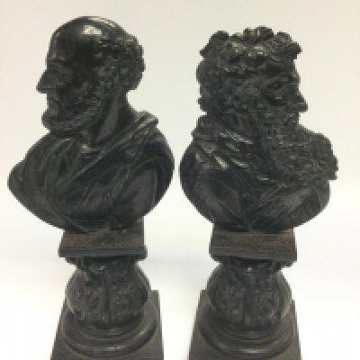 A pair of cast iron figural bookends, approx height 21cm. Shipping category c.