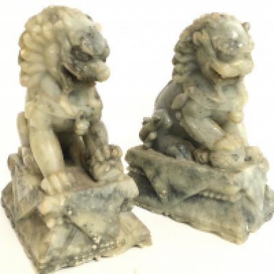 A pair of soapstone Fu Dogs, 18.5cm tall. This item cannot be posted