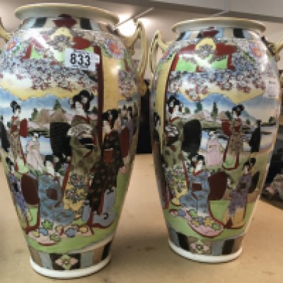 A pair of Satsuma vases decorated with Geisha, flowers and foliage. Height 39cm in height approximately- NO RESERVE
