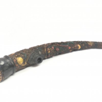 A Chinese smoking ornate pipe with decoration of figures, dragons etc. approximately 41cm long. Postage category C