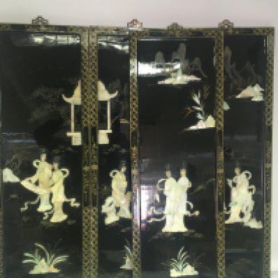 A set of four mid 20th century Oriental lacquered panels decorated with raised painted mother of pearl in the form of female figures. Height 92cm. NO RESERVE