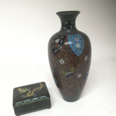 A late 19th century cloisonn&eacute; vase decorated with butterflies height 24cm and a conforming box with a hinged lid decorated with a dragon. (2)