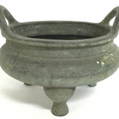 A Chinese bronze tripod censer, 12.5cm tall 16cm wide. Postage category C