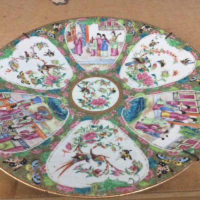 A 19th century Chinese canton charger decorated with figures birds and flowers . 35 cm .