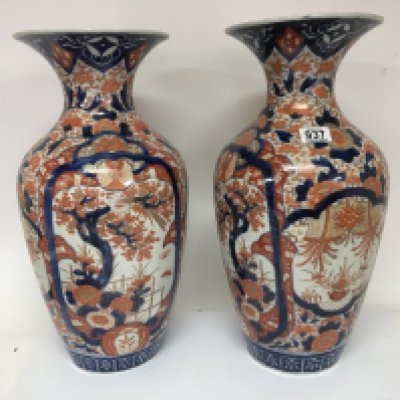 A pair of quality large late 19th Century Japanese Imari vases with floral pattern and colours of iron red and deep blue. Vase Height 50cm no obvious damage or restoration.