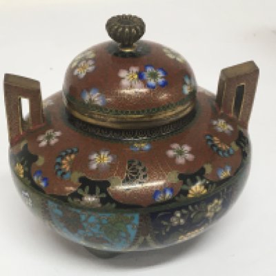 A Quality Japanese cloisonn&eacute; jar and cover decorated with sprays of flowers. With raised handles. Hight 9cm no obvious damage.