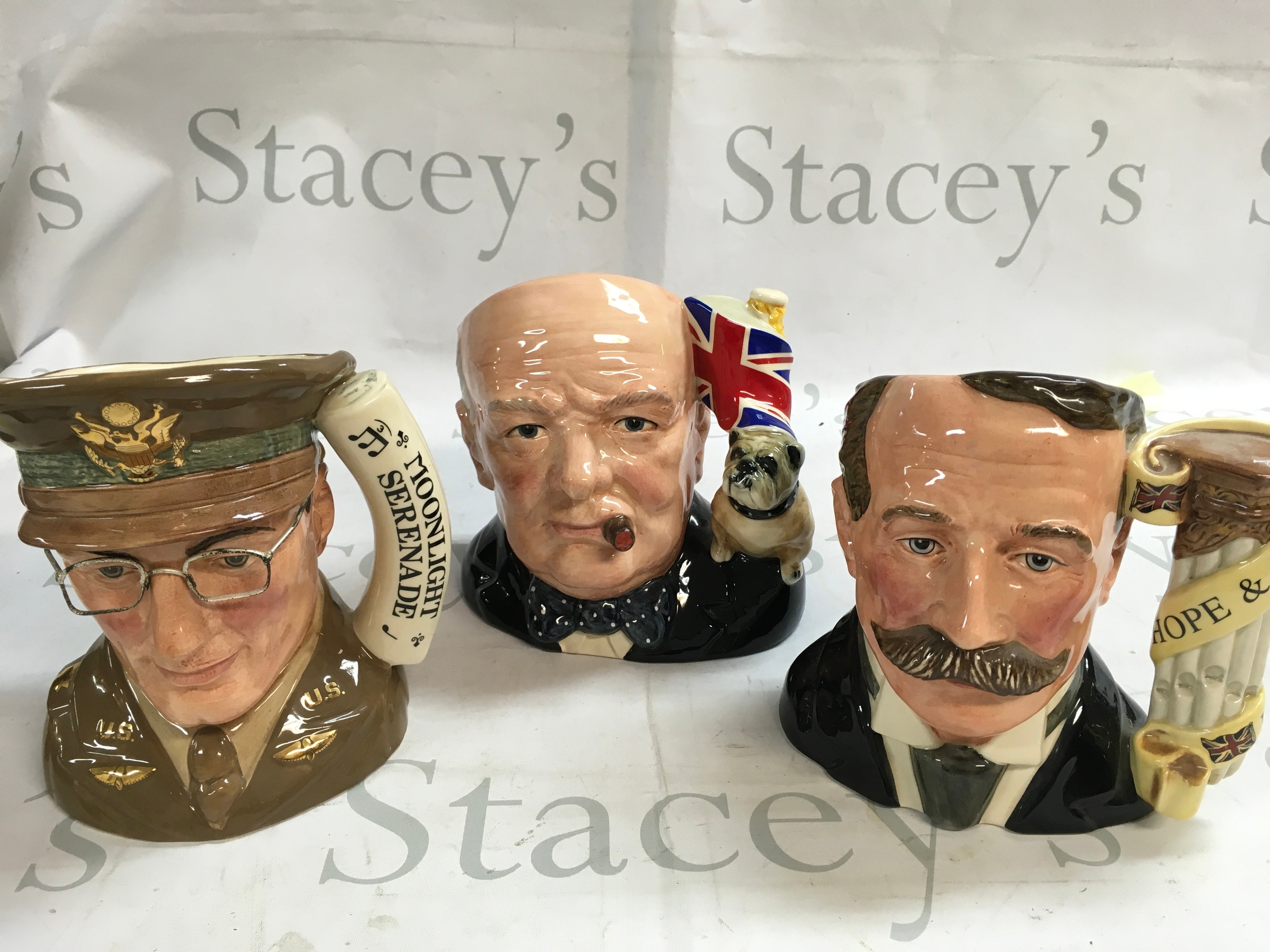 A collection of 3 Doulton Character jugs including Elgar, Glenn Miller, and Winston Churchill.