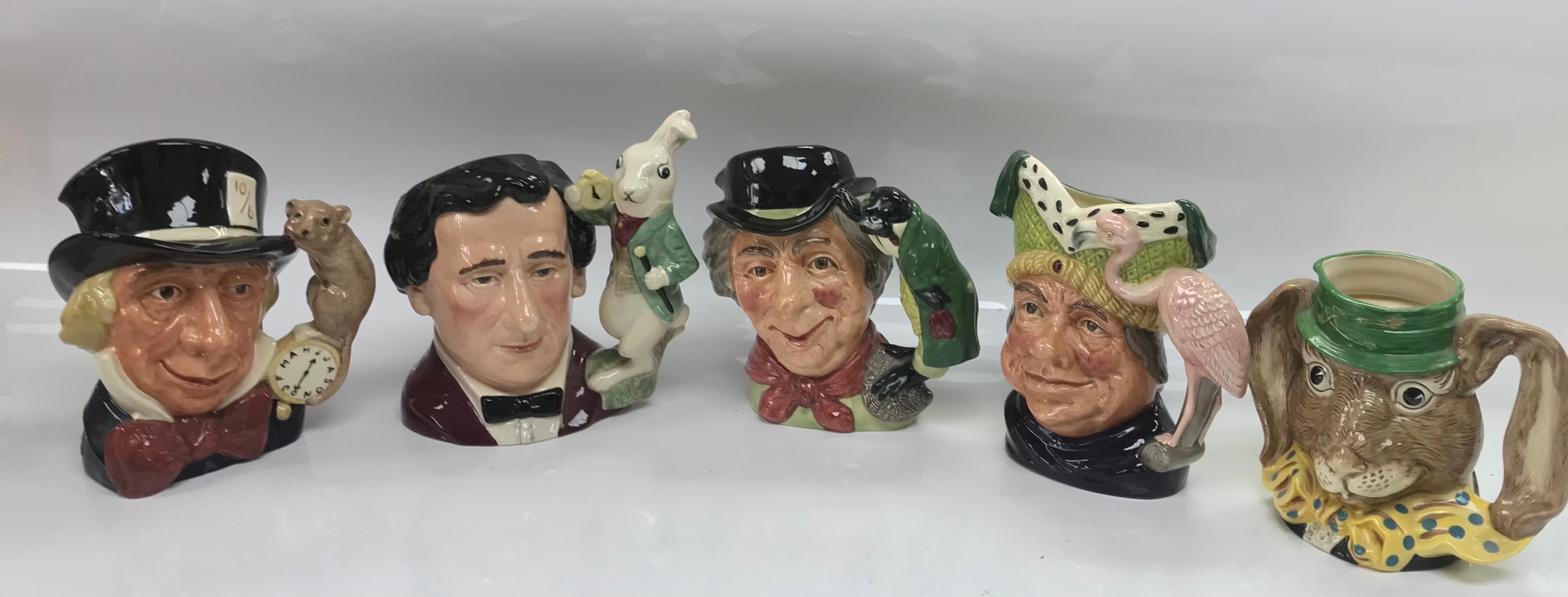 5 Royal Doulton Character jugs "Alice in the wonderland selection" . Mad hatter D 6598 . Lewis Carroll D 7096 . The walrus and carpenter D 6604 . Ugly duchess D 6599 . The March hare D 6776 