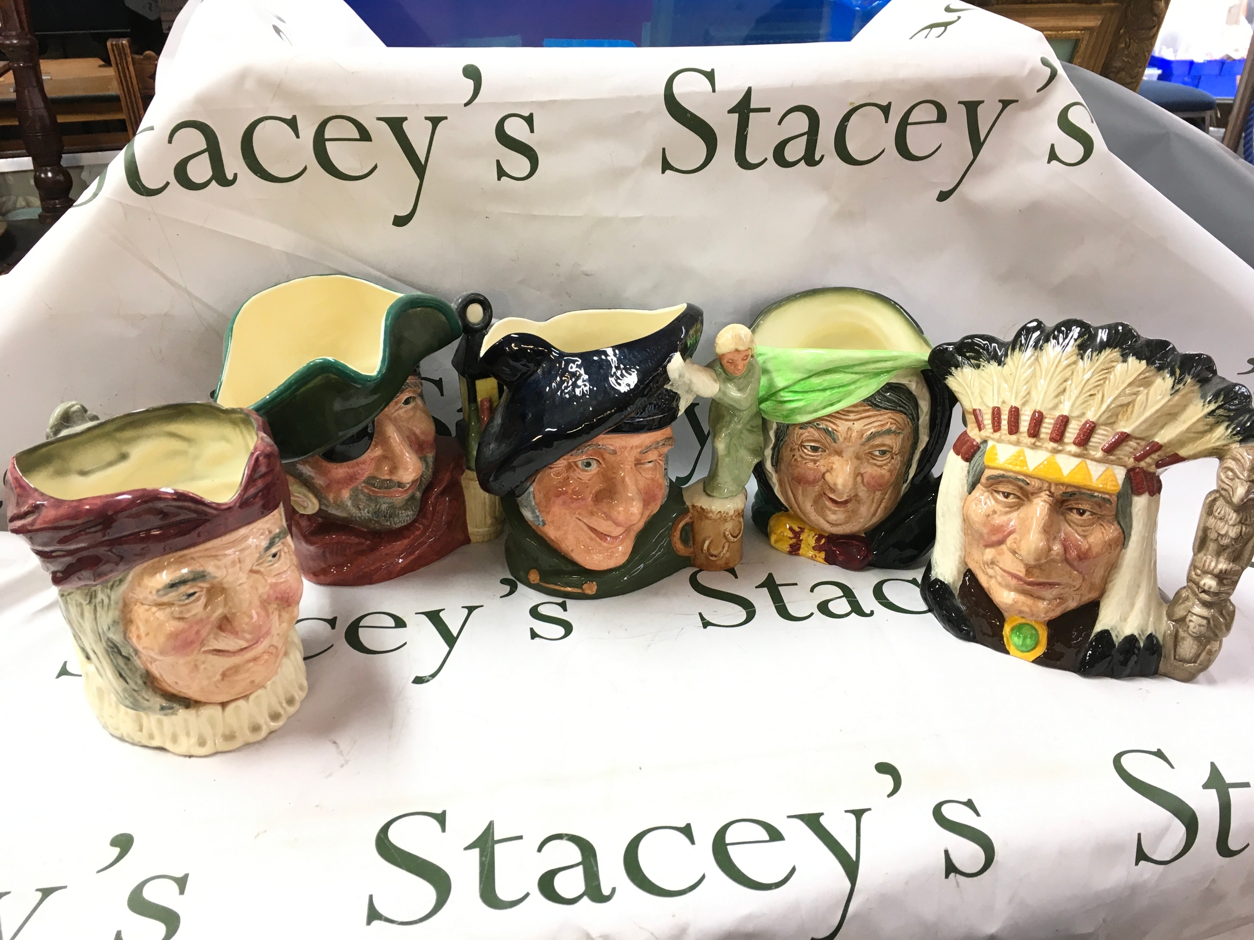 Royal Doulton character jugs including North American Indian D6611, Sairey Gamp D5451, Tam O'Shanter D6632, Smuggler 