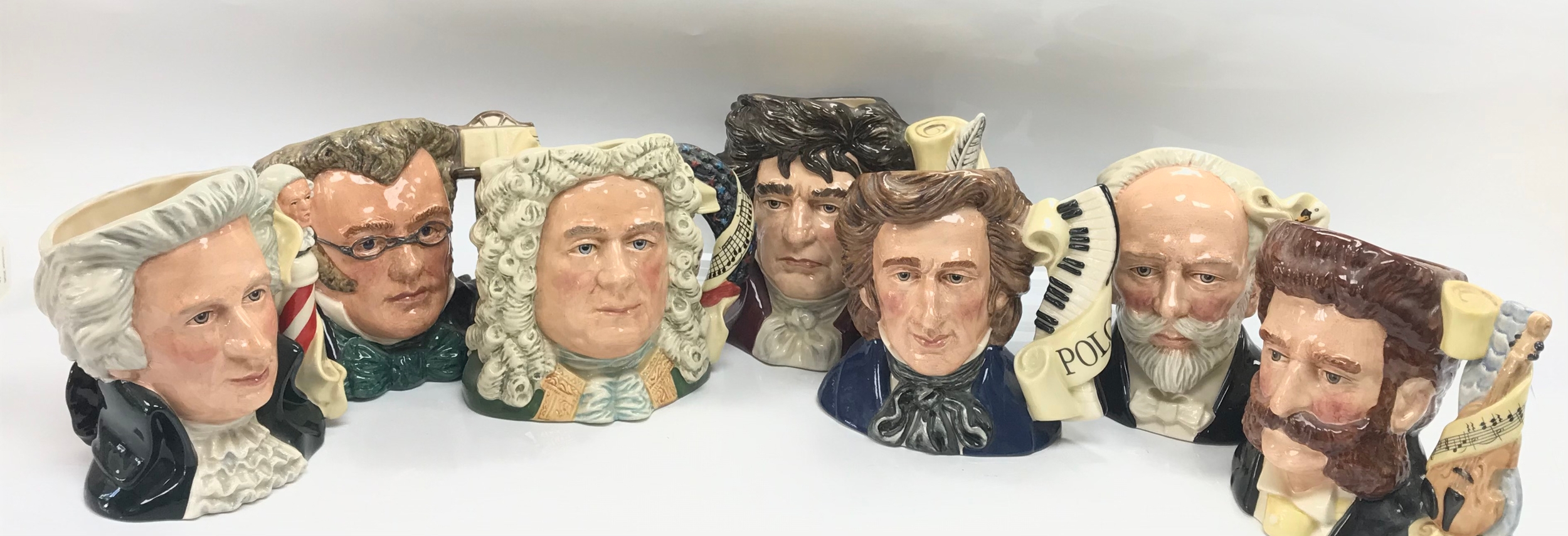 7 royal Doulton character jugs "composers" .Schubert D 7056 .Mozart D 7031 .Handel D 7080 .Beethoven D 7021 .Chopin D 7030 .Tchaikovsky D 7022 .Johann Strauss II D 7097