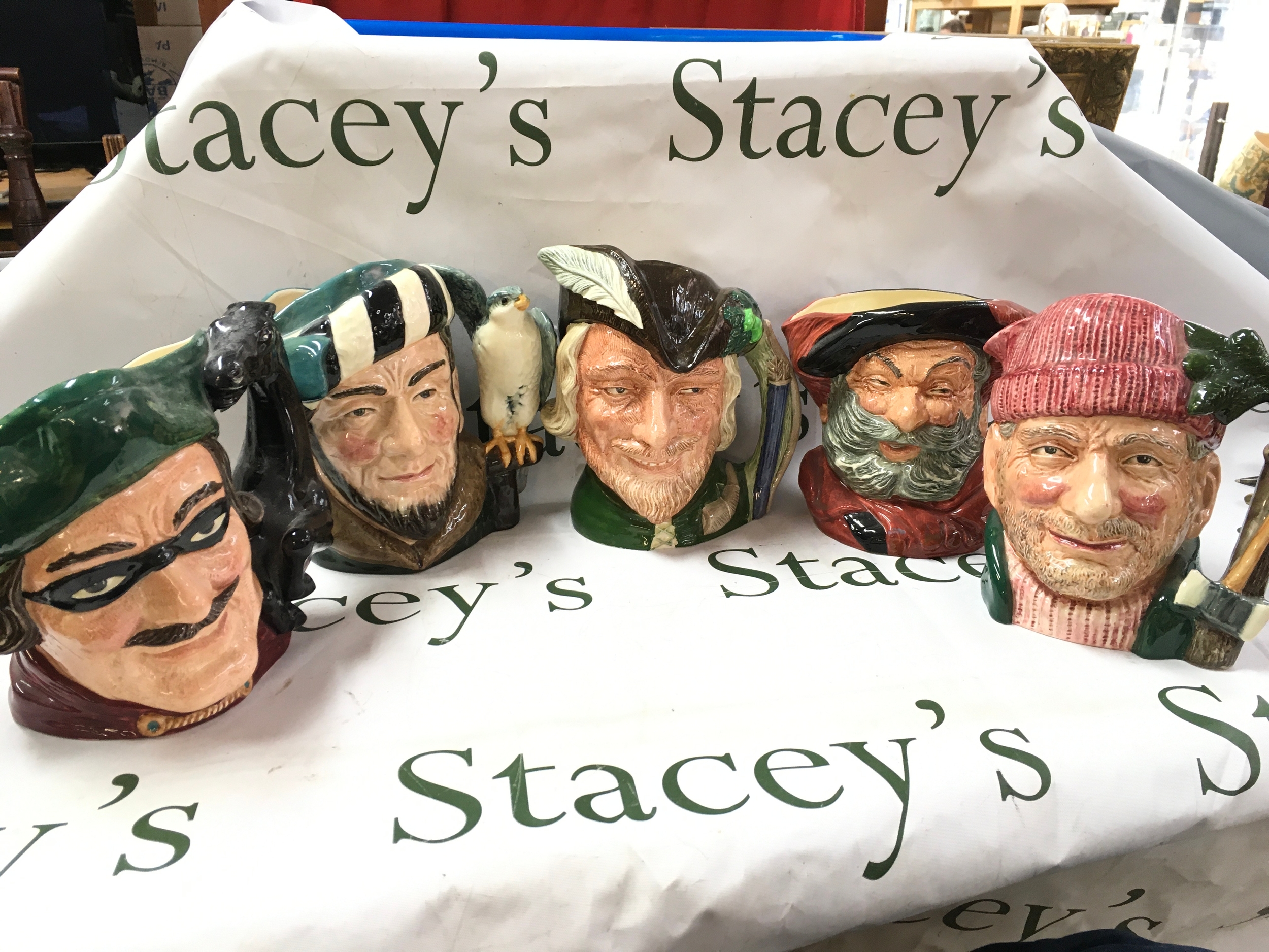 Royal Doulton character jugs including Dick Turpin D6528, The Falconer D6533, Robin Hood D6527, Falstaff D6287, Lumberjack D6610