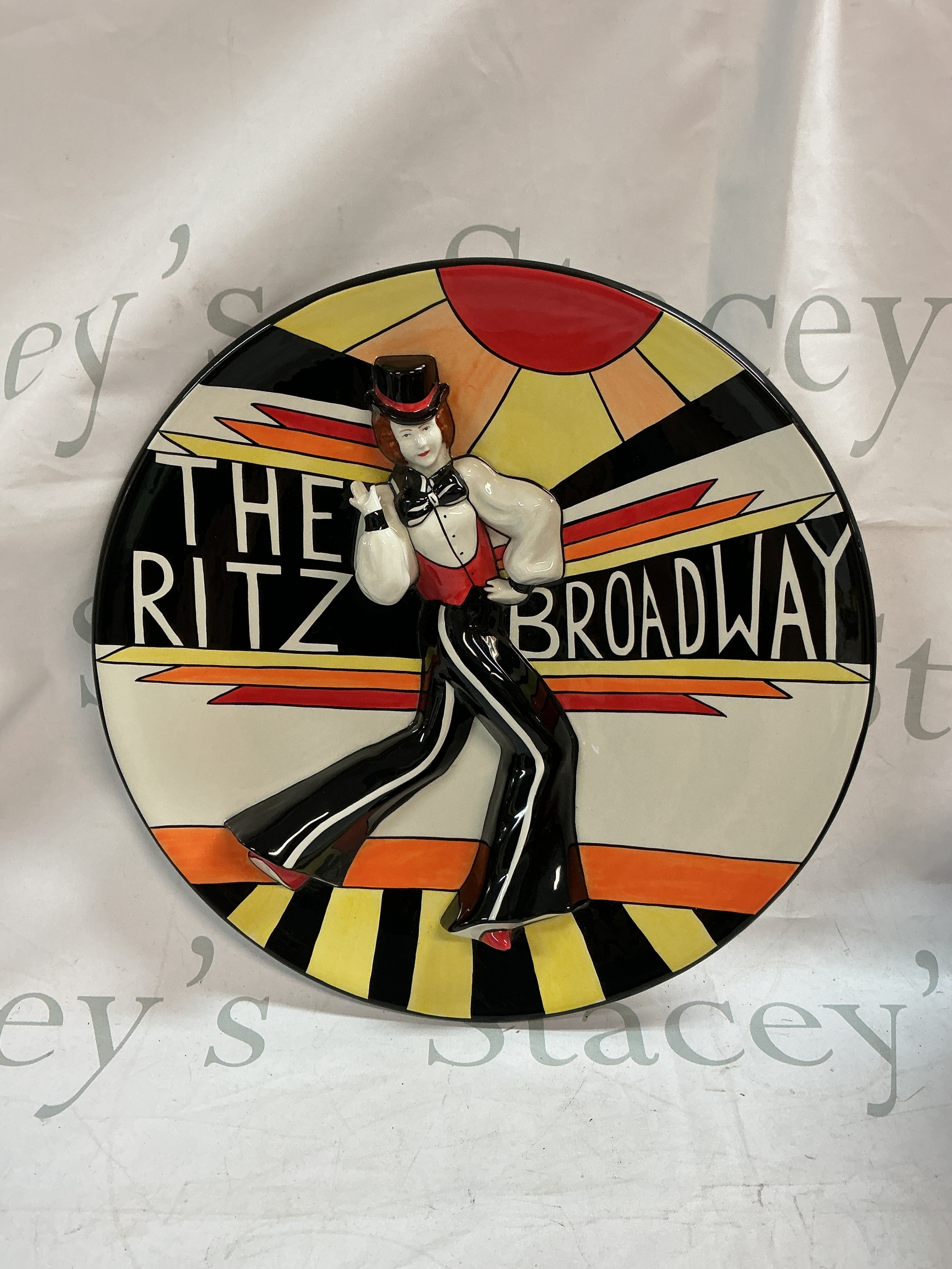 A signed Lorna Bailey limited edition number 50/100 'The Ritz Broadway' worldwide Deco Lady Charger Ginger 