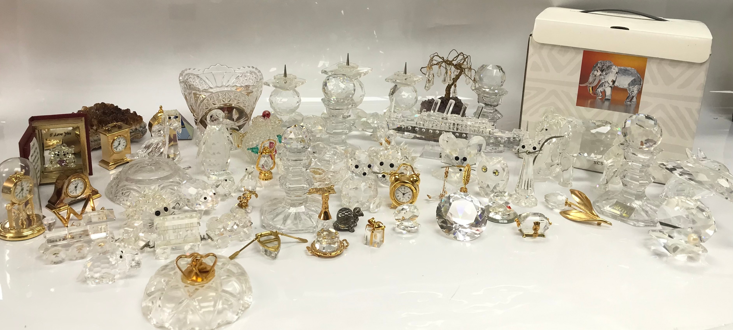 Boxed swavorski elephant along with a large collection of other unboxed swavorski figures 