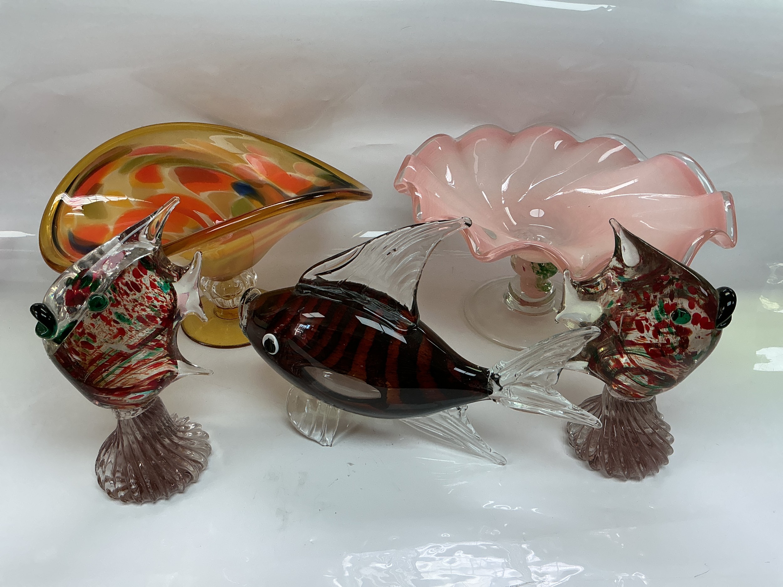 A collection of glassware including Murano style fish, bowls etc.