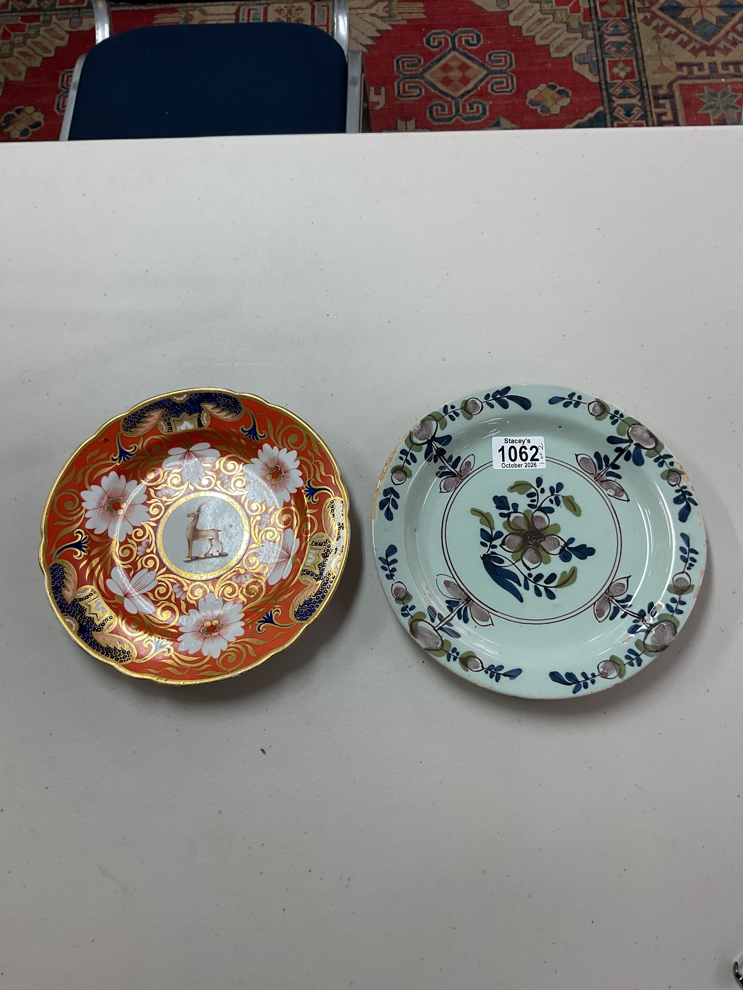 19th C plates, highly guilded example with antelope to the centre possibly from Warwickshire nobility, and the other hand painted floral majolica type.