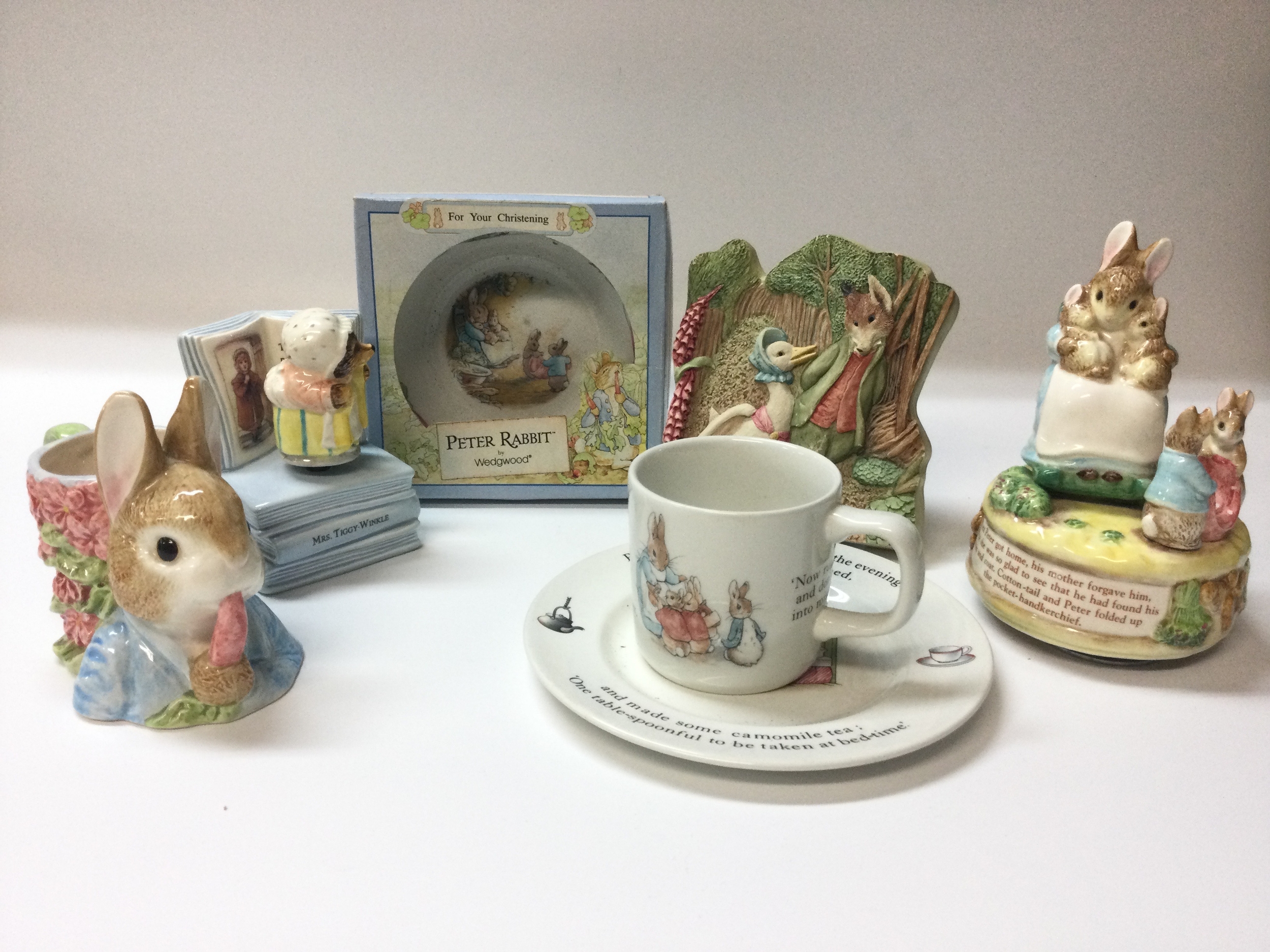 Beatrix potter Peter rabbit related musical figurines and boxed and unboxed Peter rabbit Wedgwood china.