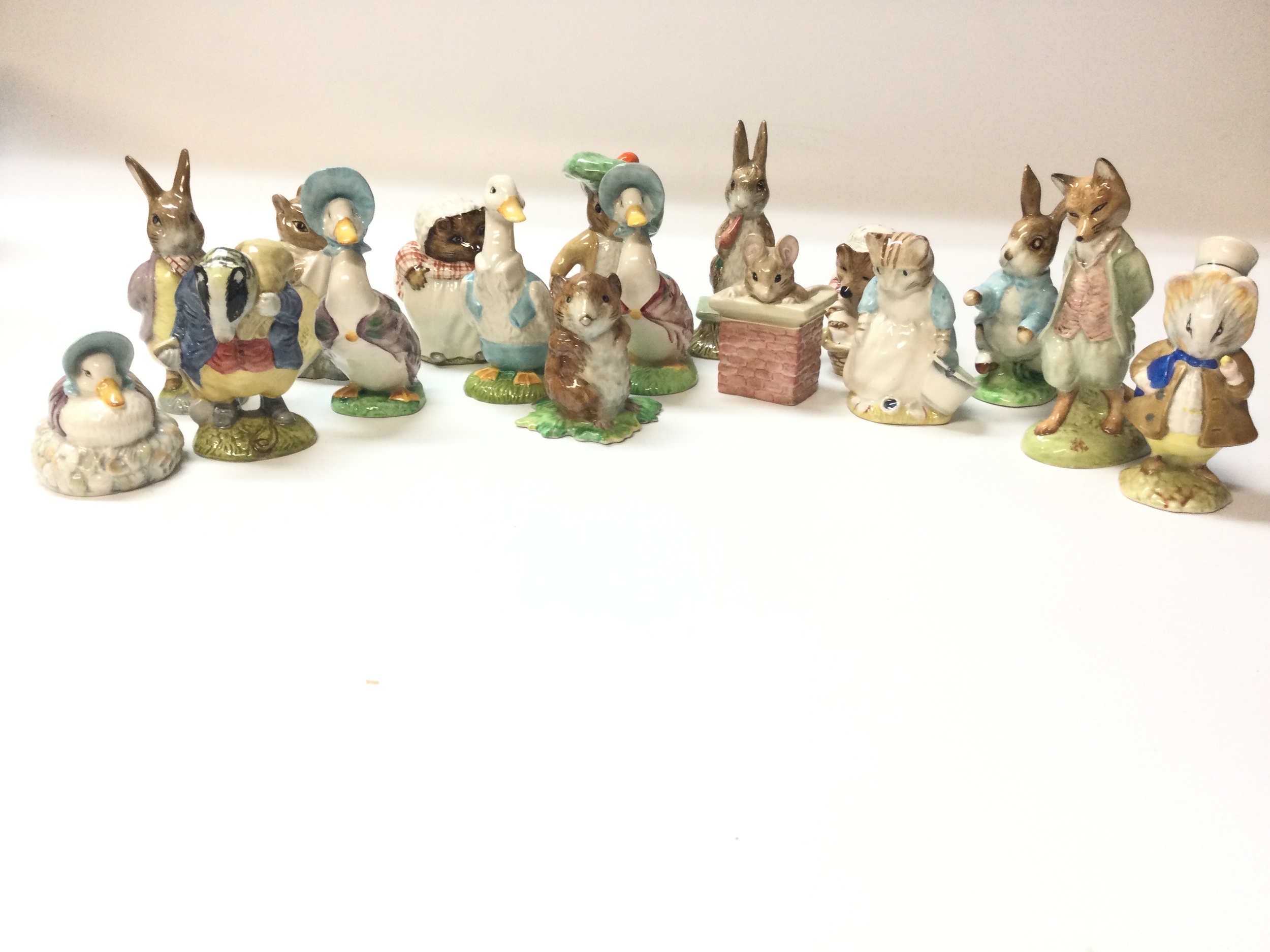 17 Beswick and Royal Albert Beatrix potter Peter rabbit figures.