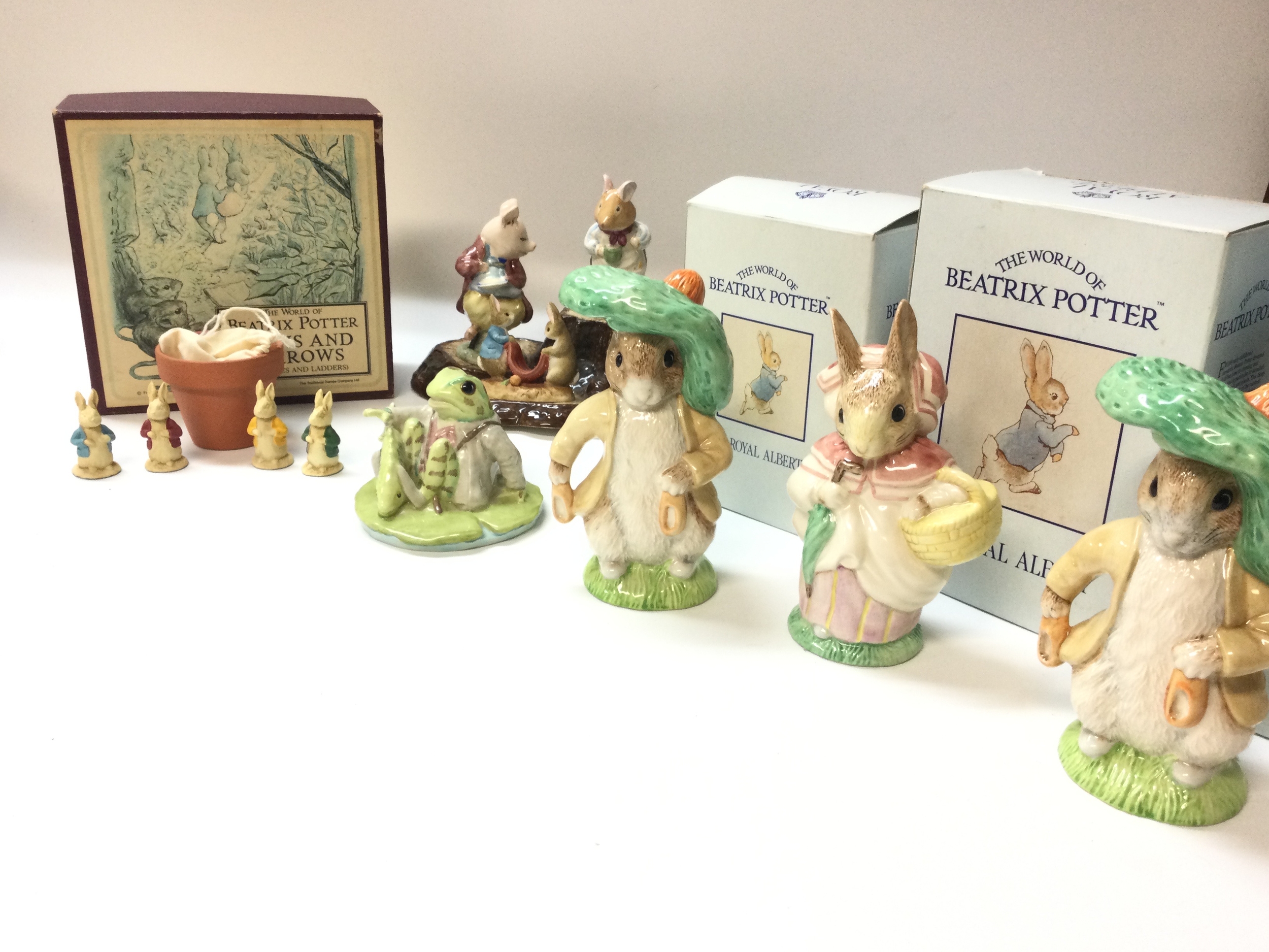 Royal Albert Beswick and Ernesto boxed and unboxed figures, Beswick Peter rabbit display and a Peter rabbit race game (complete in box)