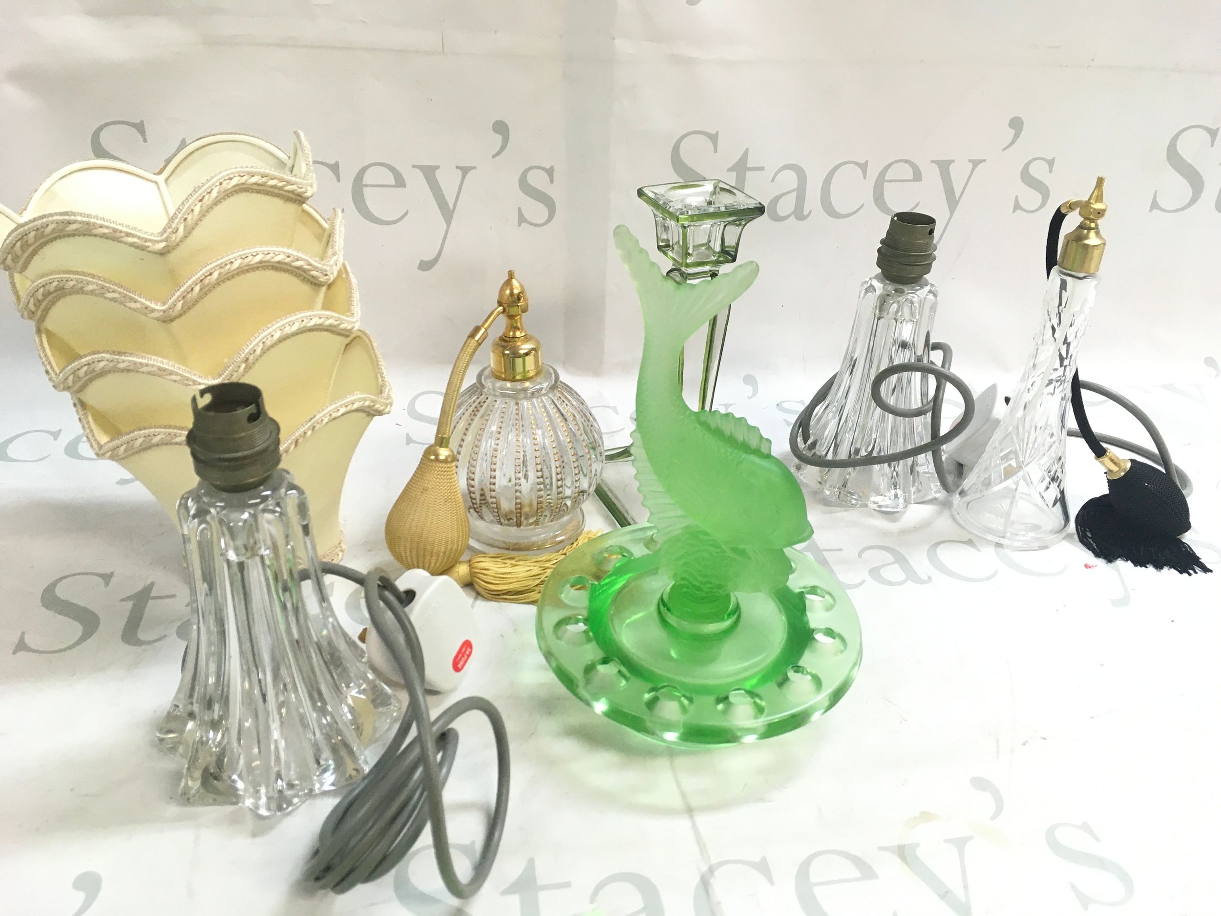 Glass lamps, glass fish, perfume bottles