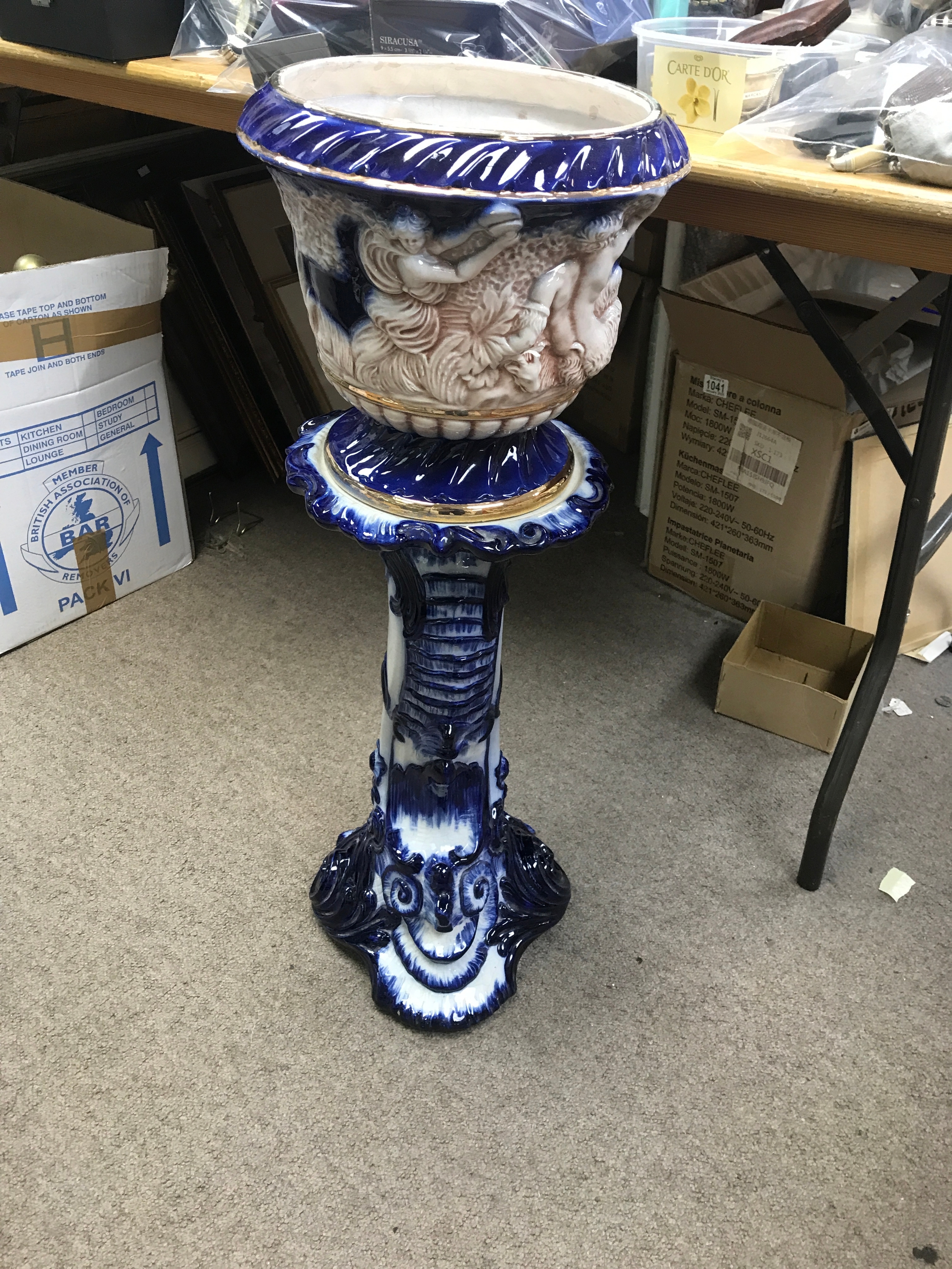 A Victorian style jardiniere and stand
