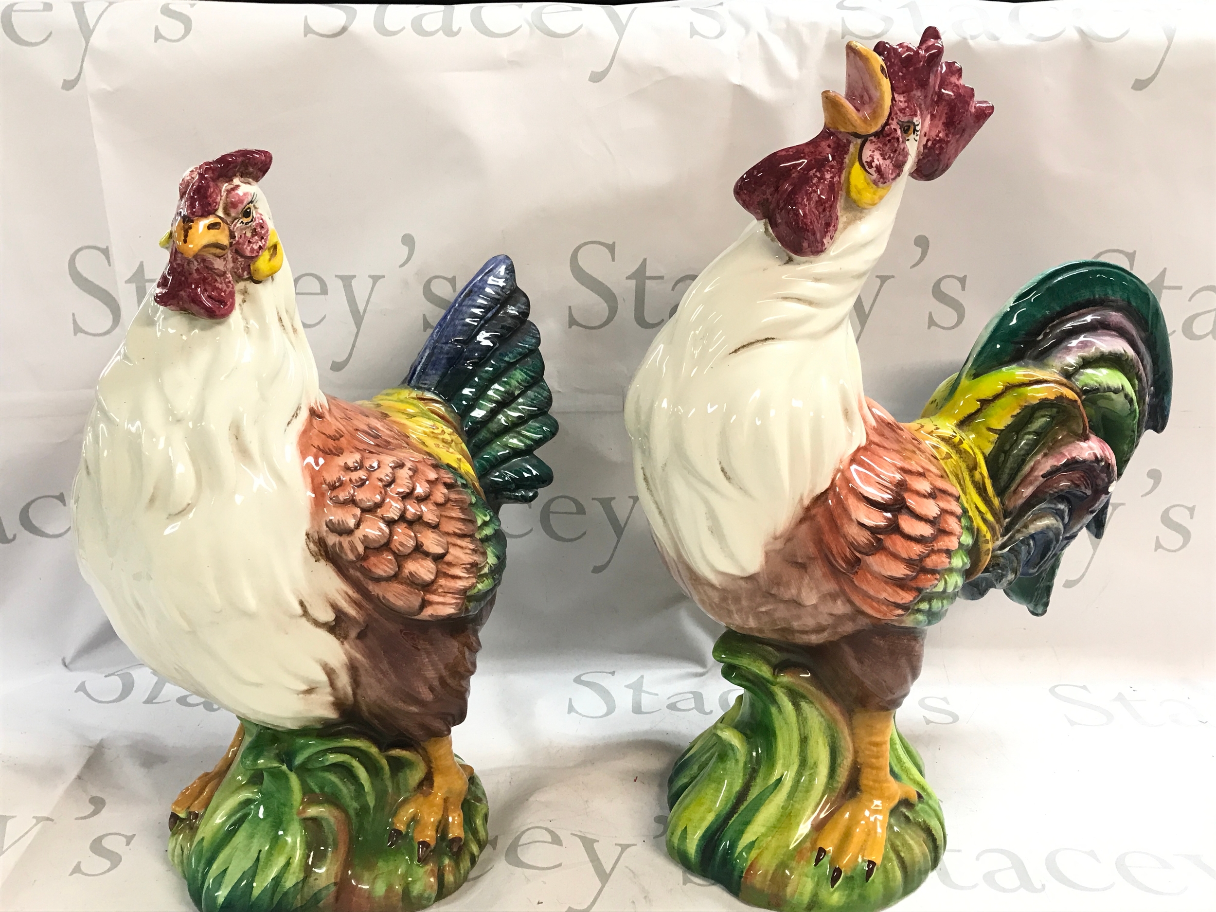 A pair of Italian large ceramic roosters 42cm and 47cm tall. Some damage