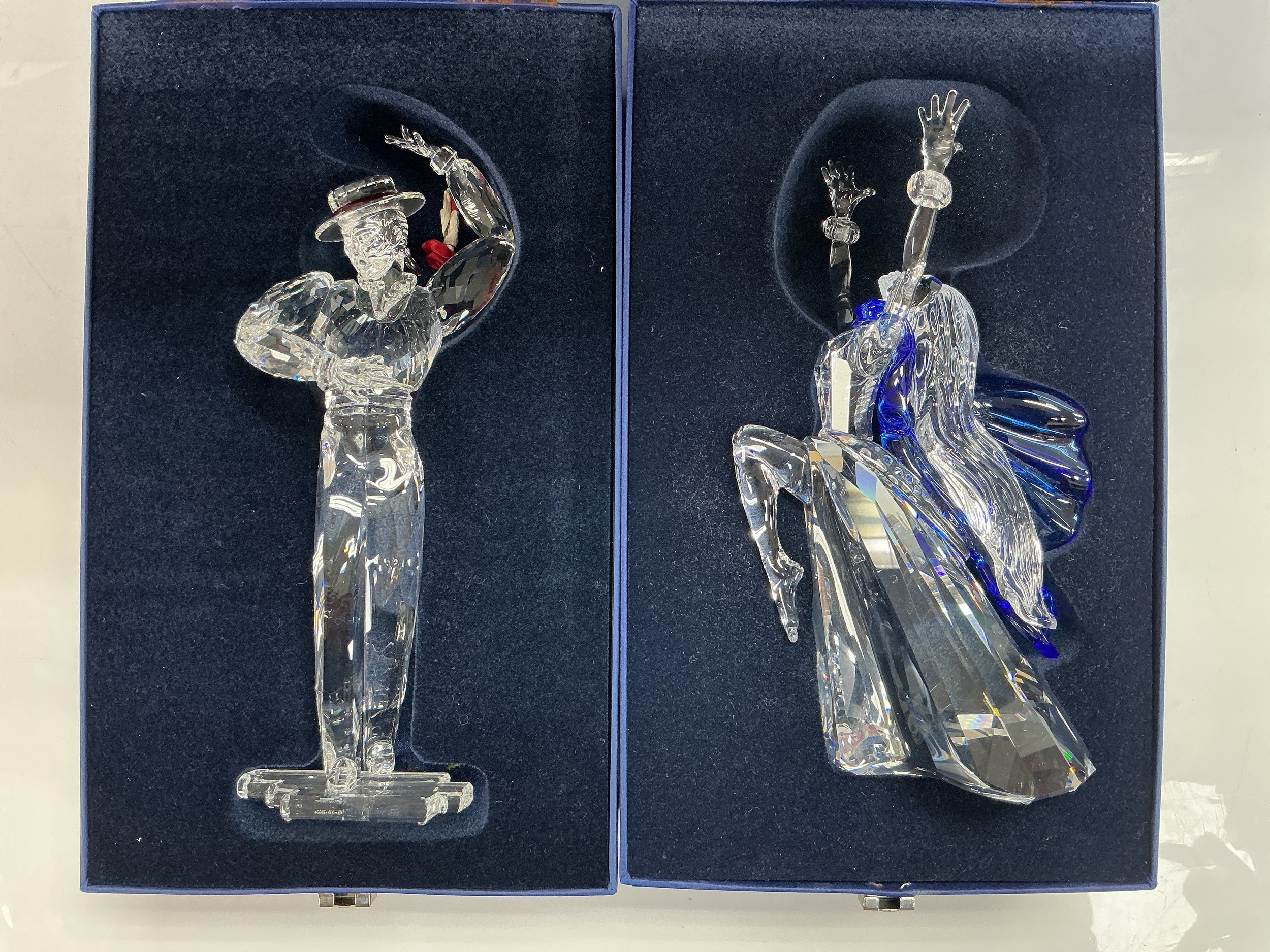 Two boxed Swarovski figures comprising Antonio (Flamenco dancer) and Isadora.