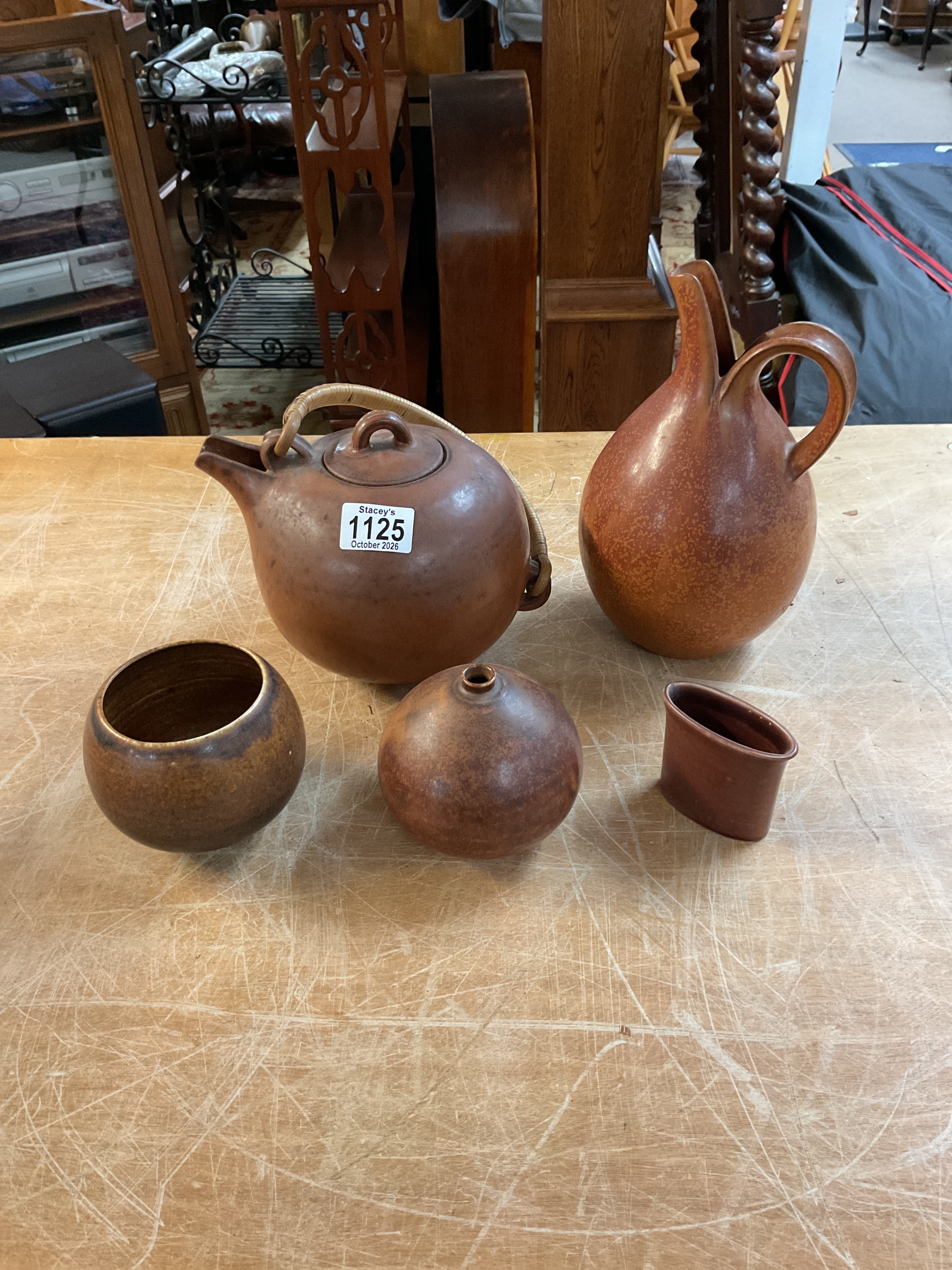 Four pieces of Danish Saxbo ceramics, along with one other .