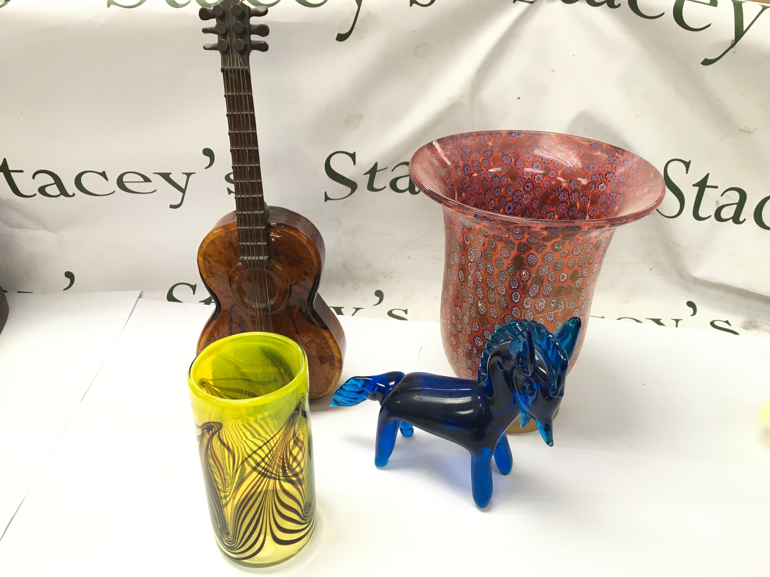 A Murano glass vase and other glass items including interesting glass guitar.