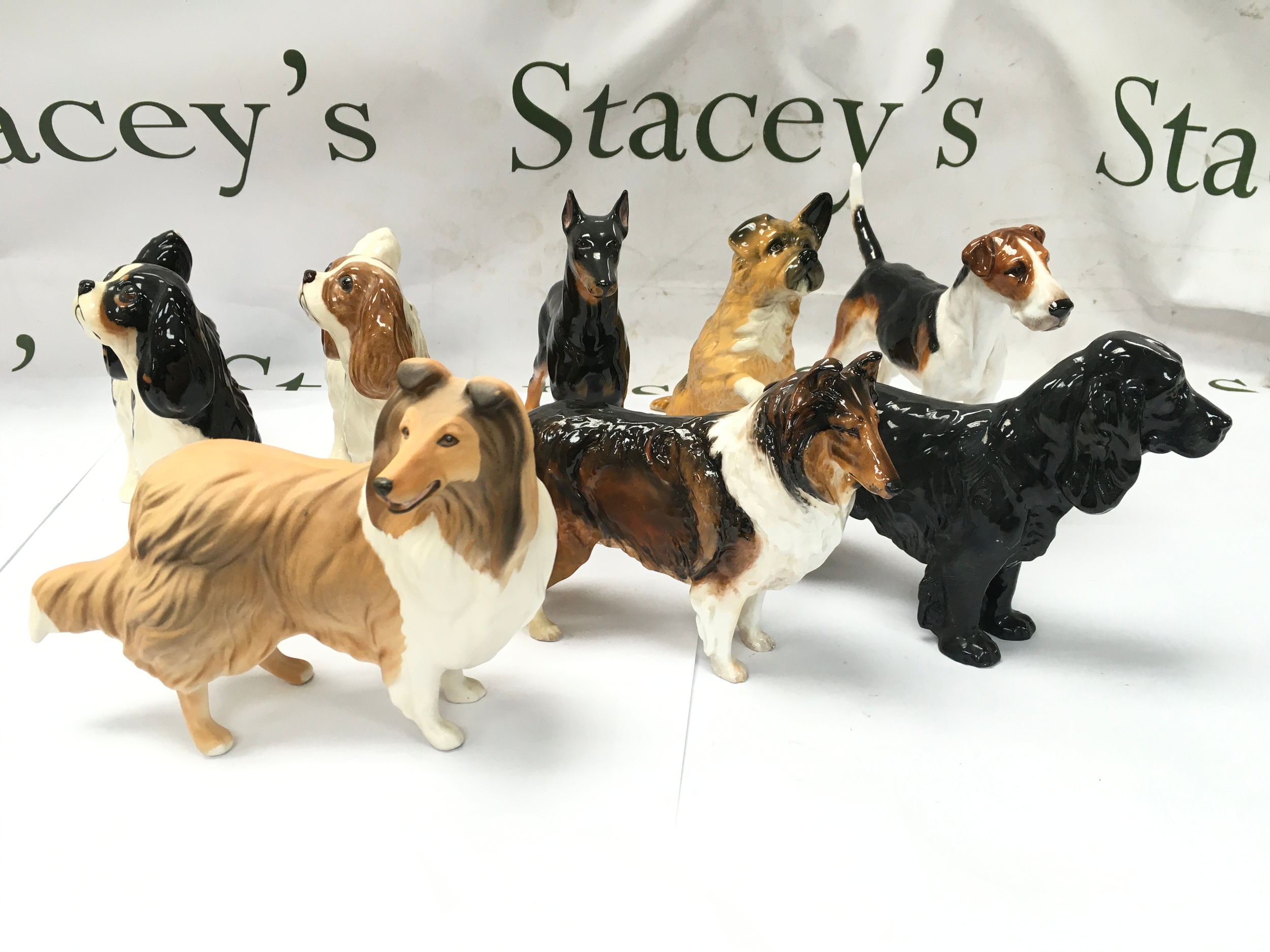 collection of vintage ceramic and porcelain dog figurines, including Beswick and similar. All on good condition with no obvious signs of damage or repair 