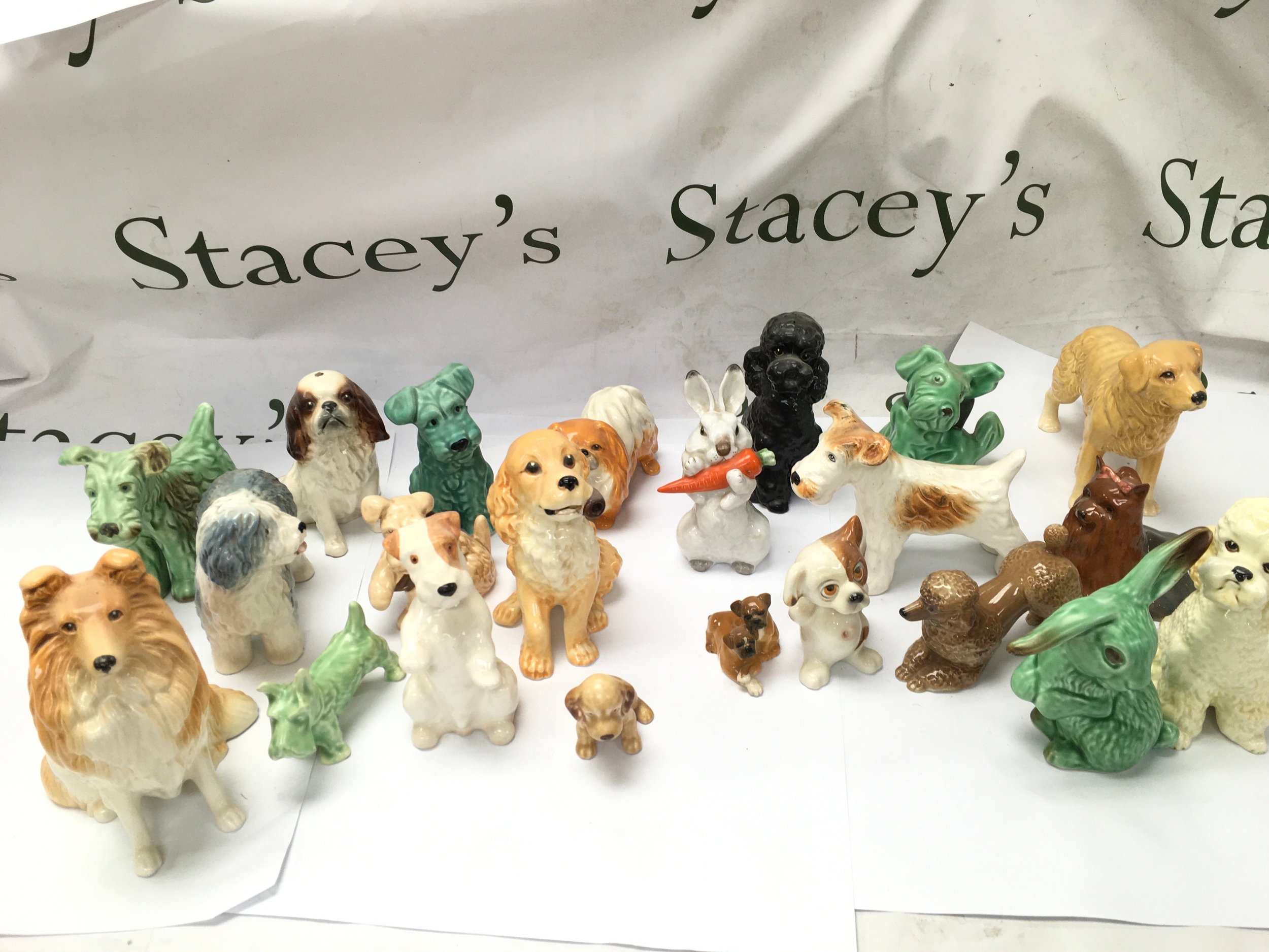 vintage ceramic and porcelain dog and rabbit figurines, likely from mid-20th-century makers such as Japan, SylvaC style