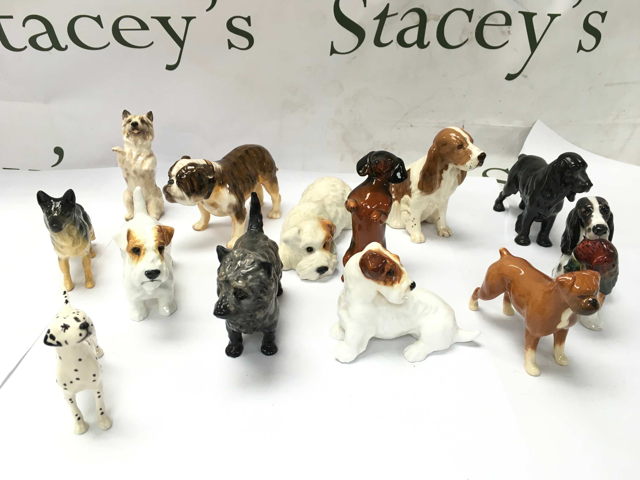 vintage ceramic and porcelain dog figurines, including makers such as Beswick, Royal Doulton Etc